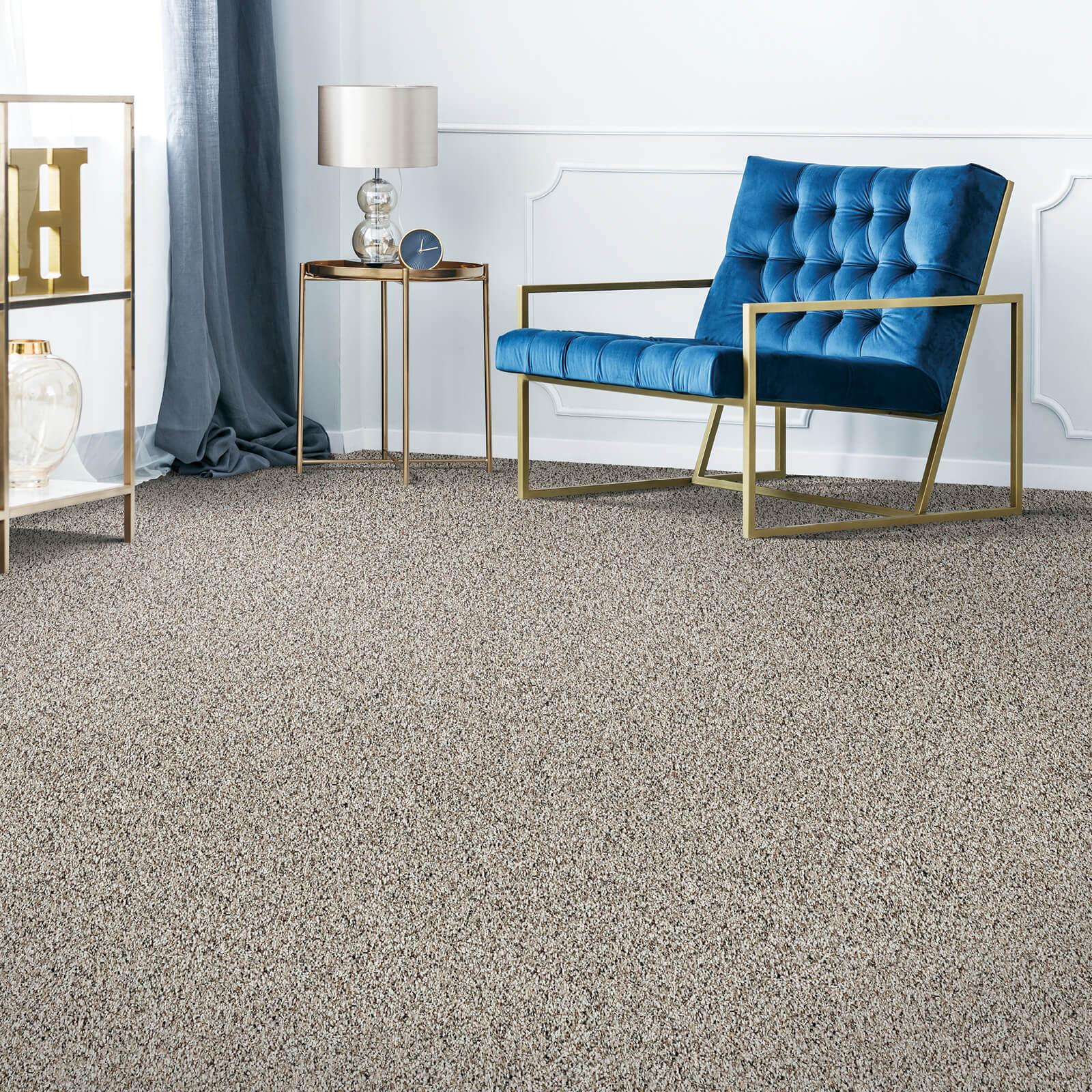 Carpet flooring with blue couch | Western States Flooring